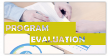 Program Evaluation title overlaying a pair of hands working on a variety of charts and graphs.